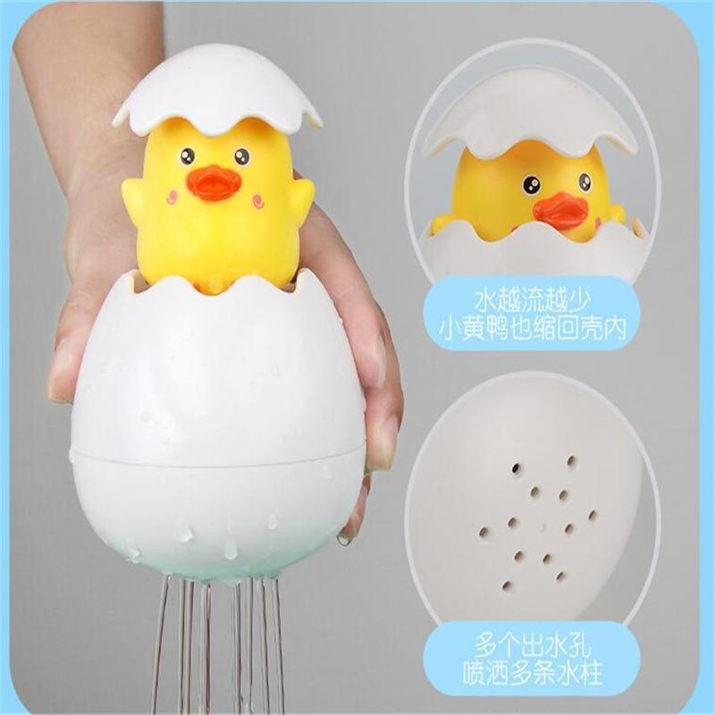 Juguete de baño de spray de agua en forma de huevo de pato pingüino para niños