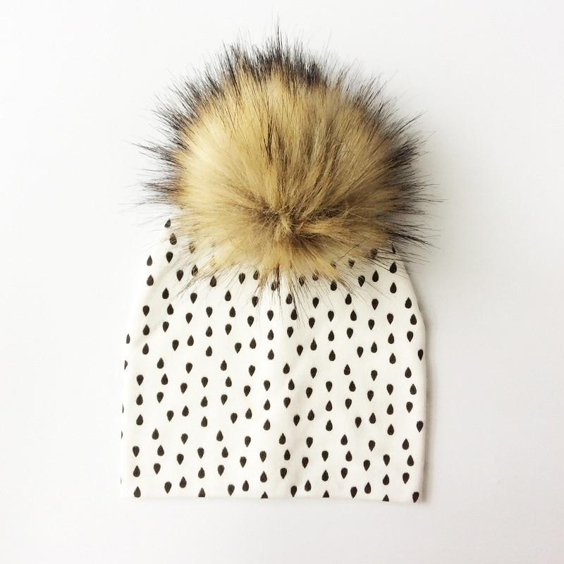 Chapeau de bébé moderne de luxe avec pompon pour l'automne et l'hiver