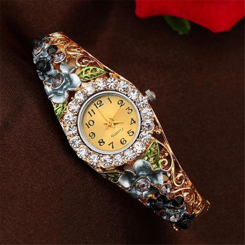 Montre de luxe pour femmes en or élégant avec émail coloré et strass