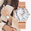Montre de poignet pour femmes en marbre rose doré de luxe