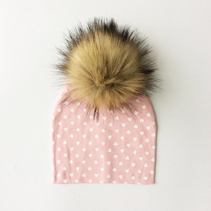 Chapeau de bébé moderne de luxe avec pompon pour l'automne et l'hiver