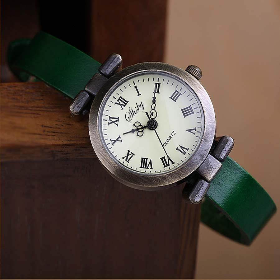 Montre en cuir vintage pour femmes avec cadran noir