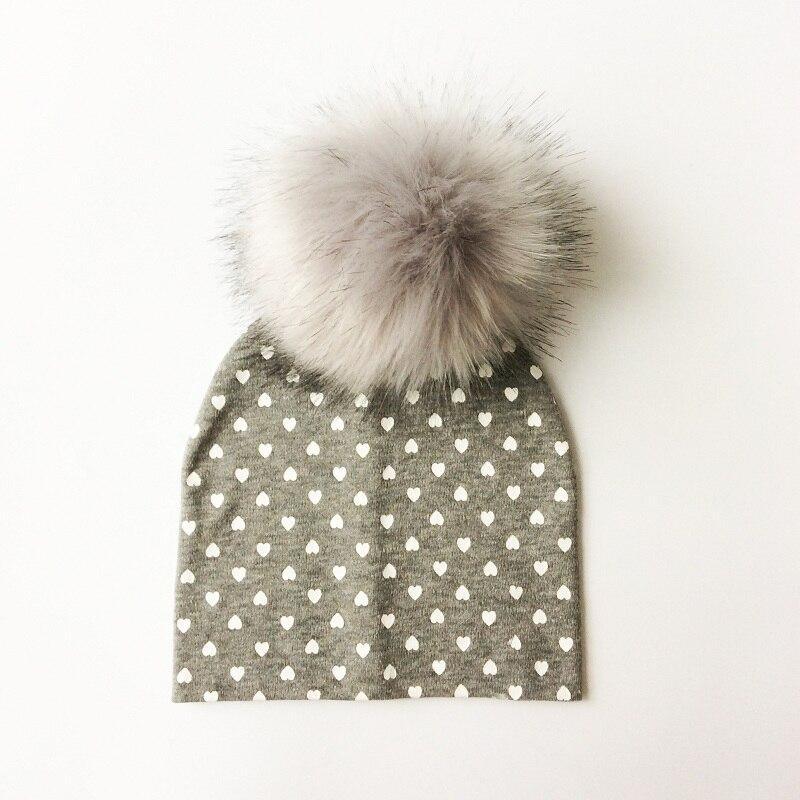 Chapeau de bébé moderne de luxe avec pompon pour l'automne et l'hiver