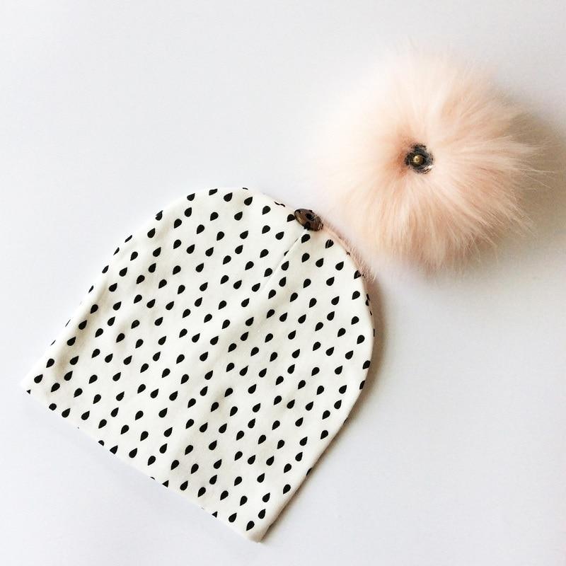Chapeau de bébé moderne de luxe avec pompon pour l'automne et l'hiver