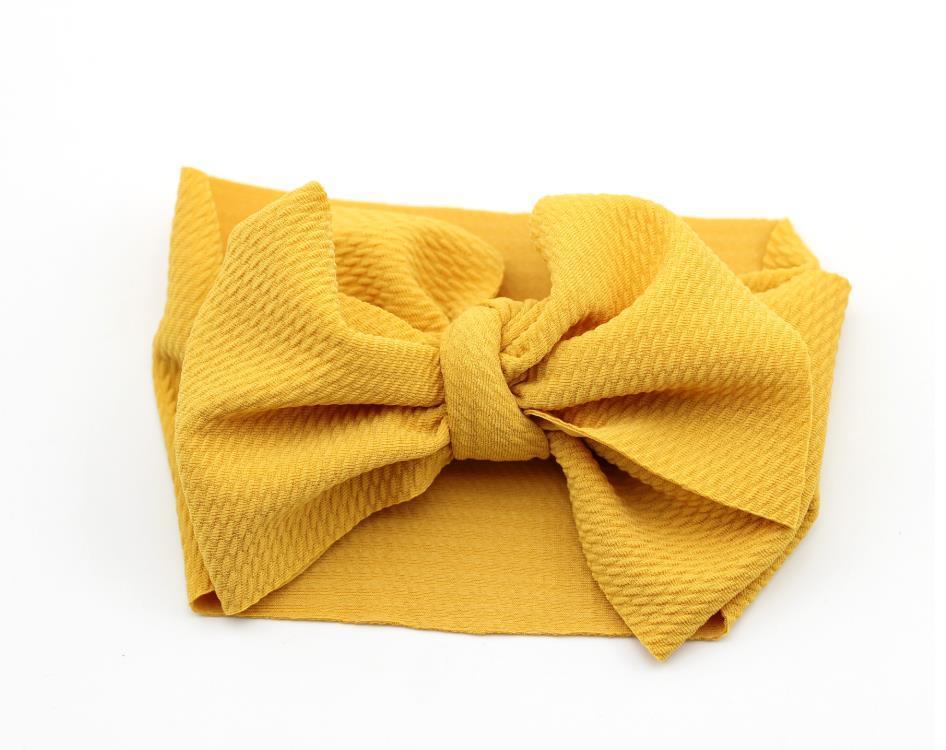 Bandeau à gros nœud ajustable pour nouveau-nés