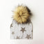 Chapeau de bébé moderne de luxe avec pompon pour l'automne et l'hiver