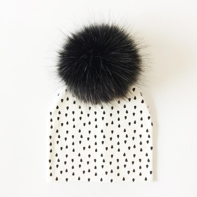 Chapeau de bébé moderne de luxe avec pompon pour l'automne et l'hiver