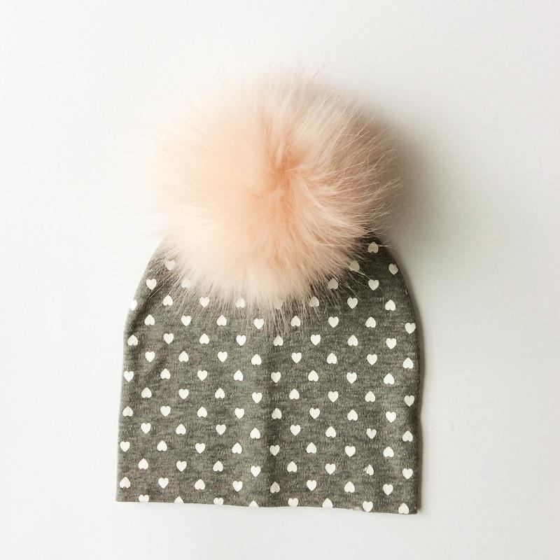 Chapeau de bébé moderne de luxe avec pompon pour l'automne et l'hiver