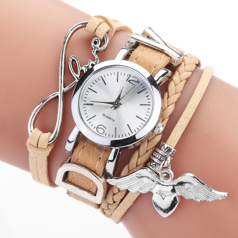 Montre en cuir avec pendentif en forme de cœur en argent pour femmes