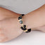 Bracelet en cuir et acier inoxydable à charms multi-couches élégant