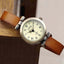 Montre en cuir vintage pour femmes avec cadran noir