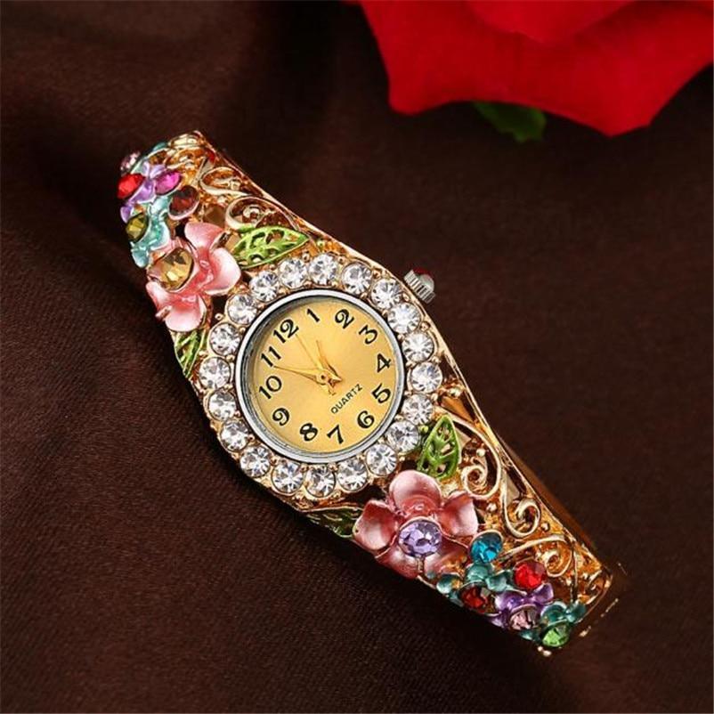 Montre de luxe pour femmes en or élégant avec émail coloré et strass