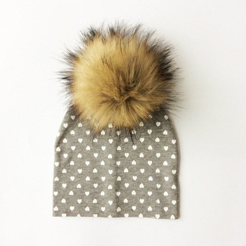 Chapeau de bébé moderne de luxe avec pompon pour l'automne et l'hiver