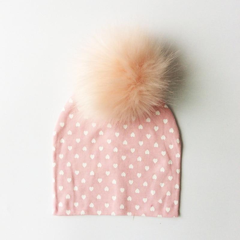 Chapeau de bébé moderne de luxe avec pompon pour l'automne et l'hiver