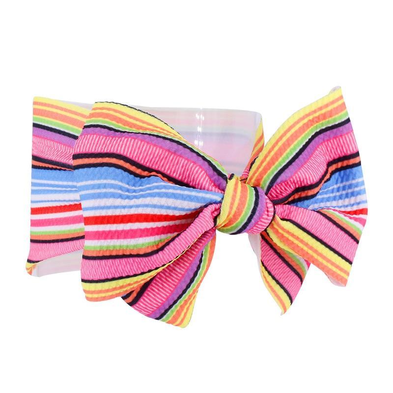 Diadema de lujo colorida para recién nacidos y niños pequeños con lazo