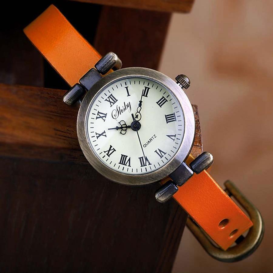 Montre en cuir vintage pour femmes avec cadran noir