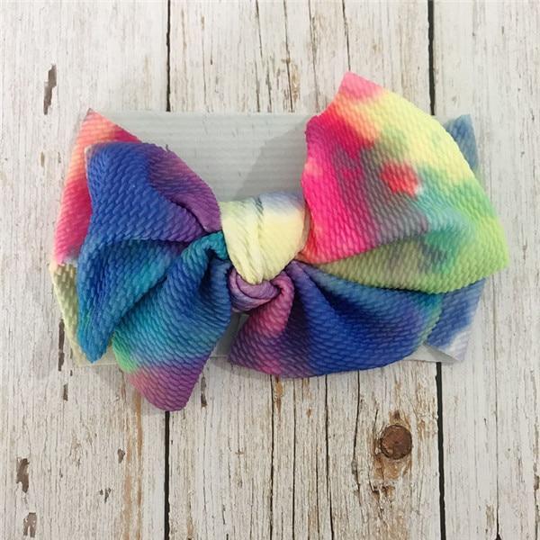 Diadema de lujo colorida para recién nacidos y niños pequeños con lazo