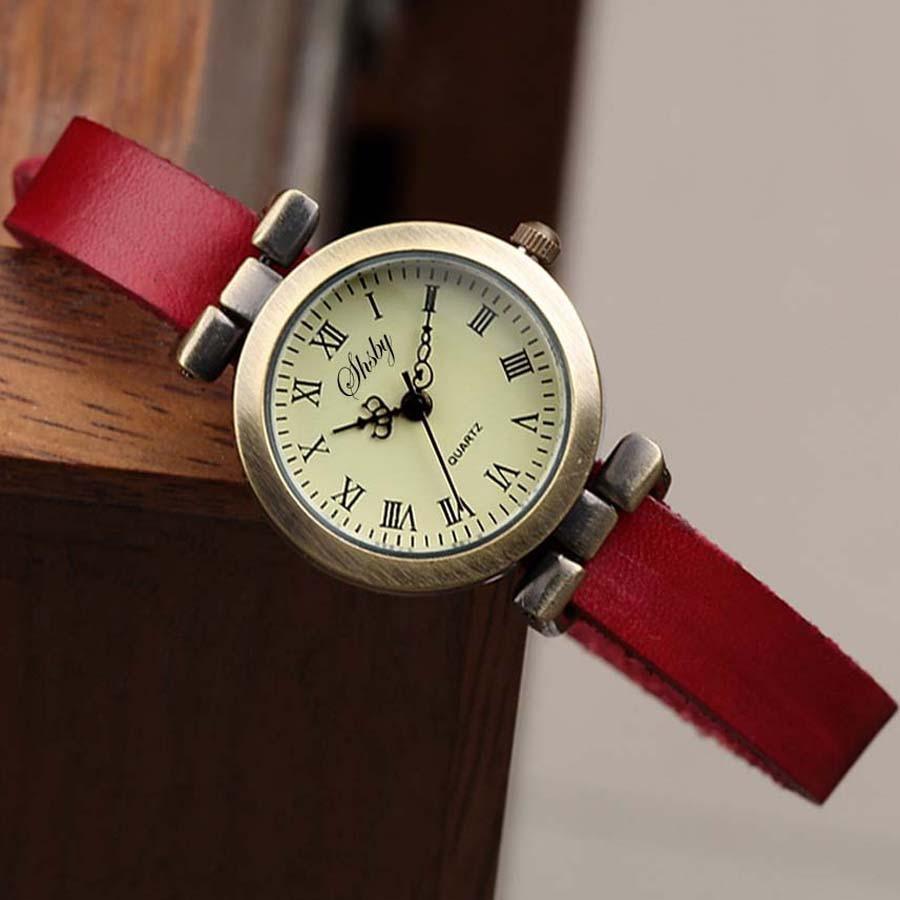 Montre en cuir vintage pour femmes avec cadran noir