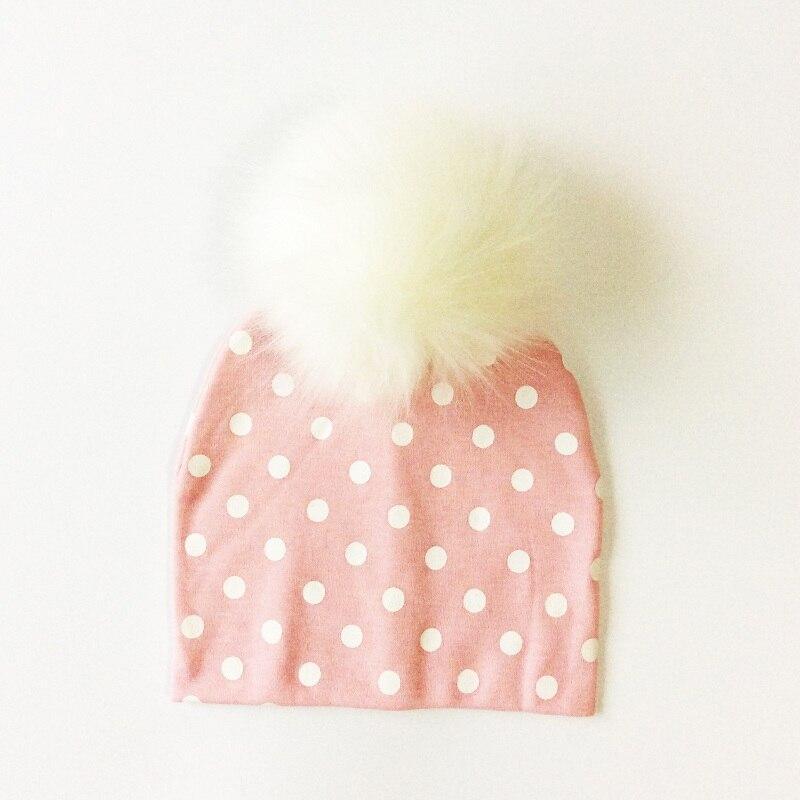 Chapeau de bébé moderne de luxe avec pompon pour l'automne et l'hiver