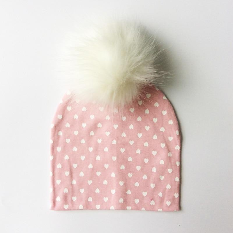 Chapeau de bébé moderne de luxe avec pompon pour l'automne et l'hiver