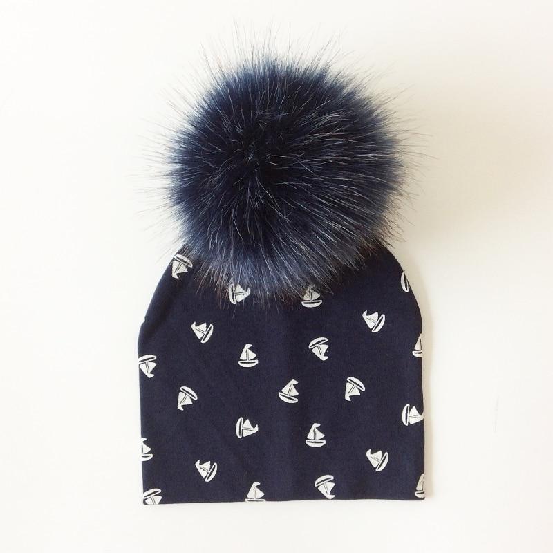 Chapeau de bébé moderne de luxe avec pompon pour l'automne et l'hiver