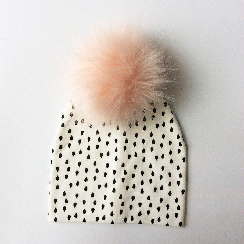 Chapeau de bébé moderne de luxe avec pompon pour l'automne et l'hiver