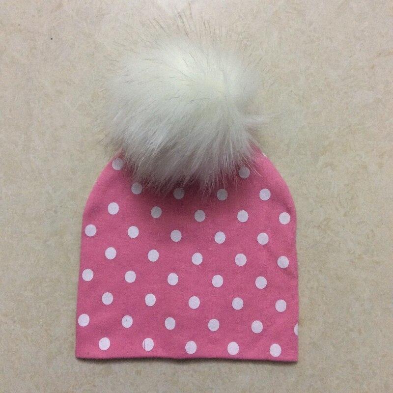 Chapeau de bébé moderne de luxe avec pompon pour l'automne et l'hiver