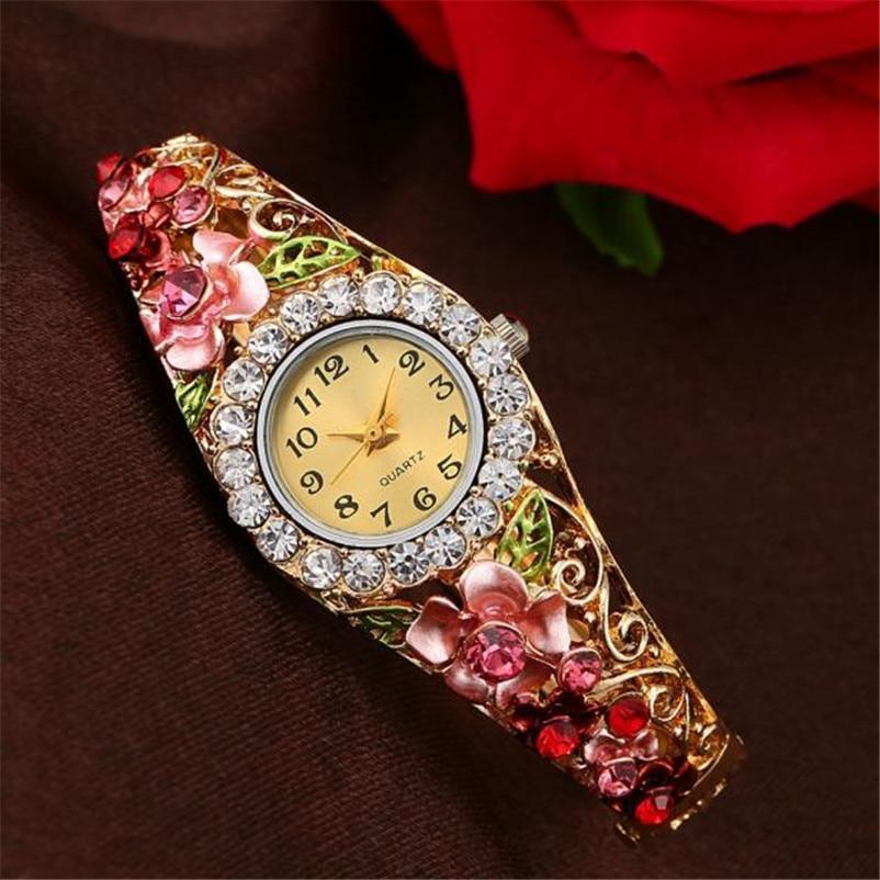Montre de luxe pour femmes en or élégant avec émail coloré et strass
