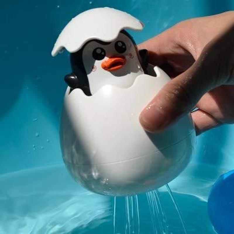 Juguete de baño de spray de agua en forma de huevo de pato pingüino para niños