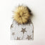 Chapeau de bébé moderne de luxe avec pompon pour l'automne et l'hiver