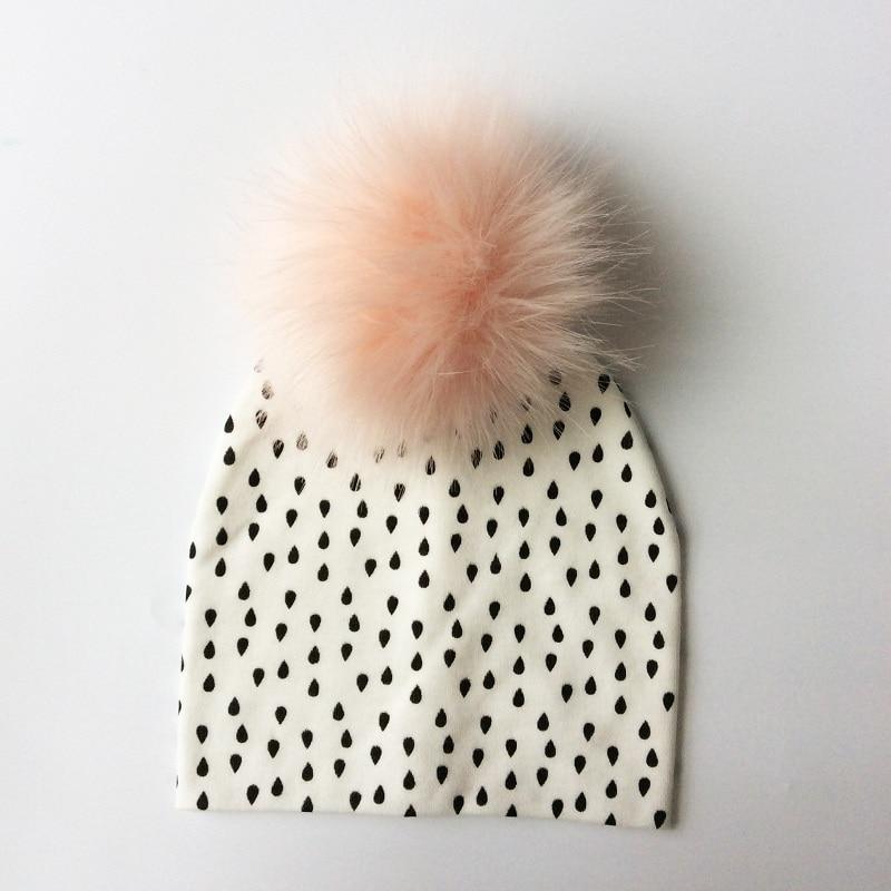 Chapeau de bébé moderne de luxe avec pompon pour l'automne et l'hiver