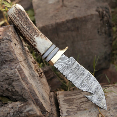 Artisan Crafted Damascus Steel Guthook Skinning Knife – 9" Stag Horn Handle with Brass Guard & Leather Sheath - Korvel