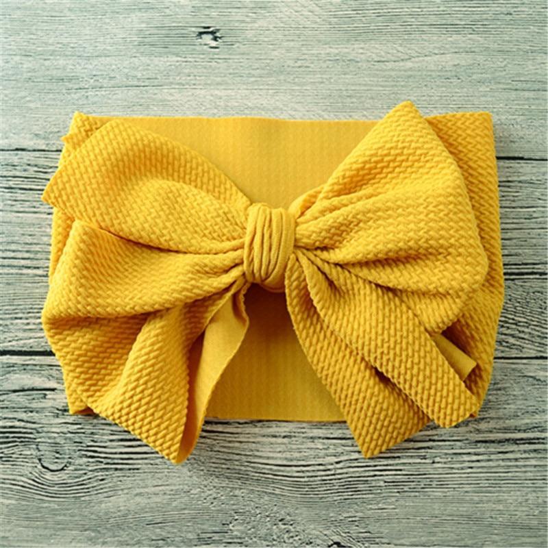 Nouveau bandeau large avec nœud pour bébés filles
