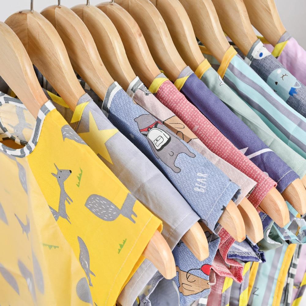 Bibs de bebé de dibujos animados ecológicos - Ajustables y a prueba de agua