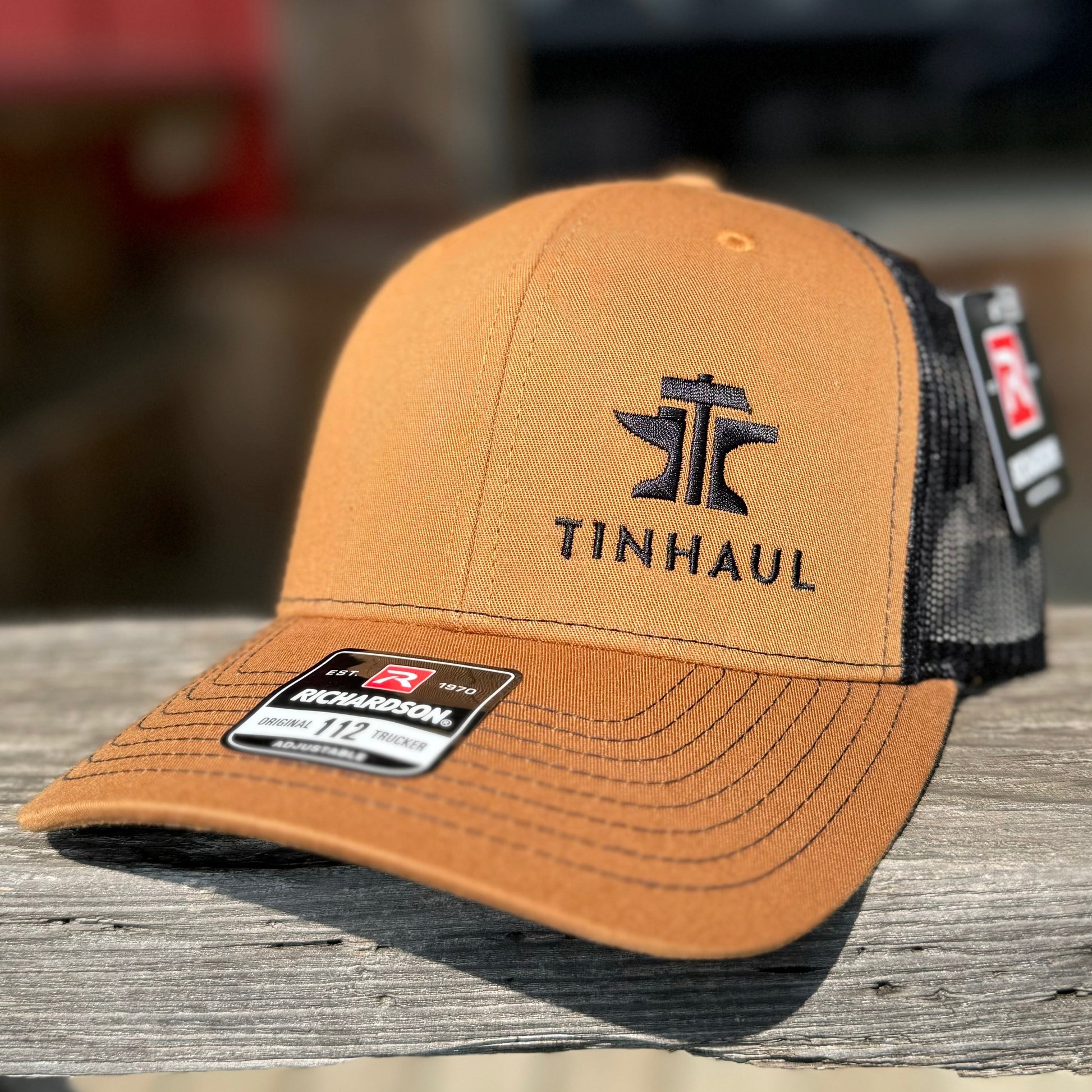 Stylish Tan Trucker Cap with Bold Logo | Tin Haul - Korvel