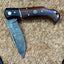 Experience the Elegance of Our Premium Damascus Steel Folding Knife with Rosewood Handle - Korvel