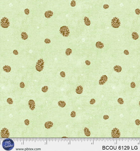 Tissu en coton Bigfoot Country à motifs de pommes de pin vert clair