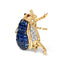 Broche en or jaune 18K en forme de bourdon avec diamants et saphirs