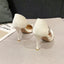 Elegant Black Suede High Heels with Gold Leather Accents