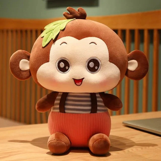 Jouets en peluche singe assis charmants pour tous les âges