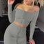 Conjunto de Falda con Mangas Largas y Hombros Descubiertos con Botones
