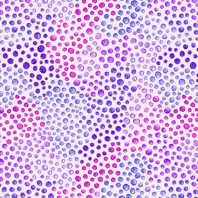 Tela de algodón con gotas de arcoíris en rosa y púrpura de lilas