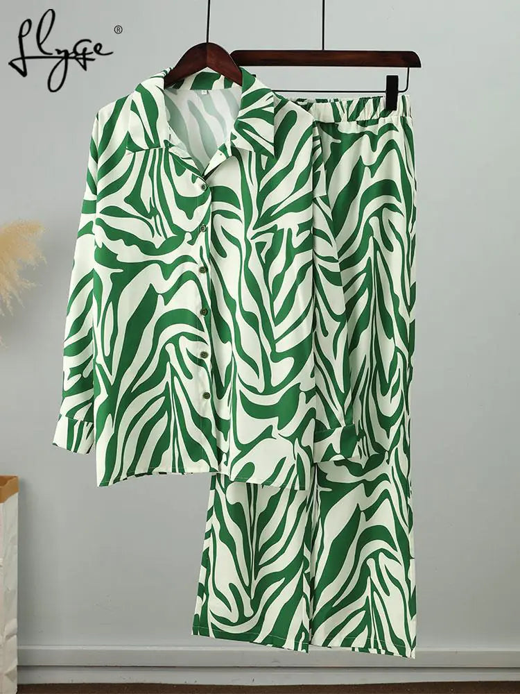 Conjunto de Pantalones de Rayas Sueltos Elegantes con Top de Manga Larga