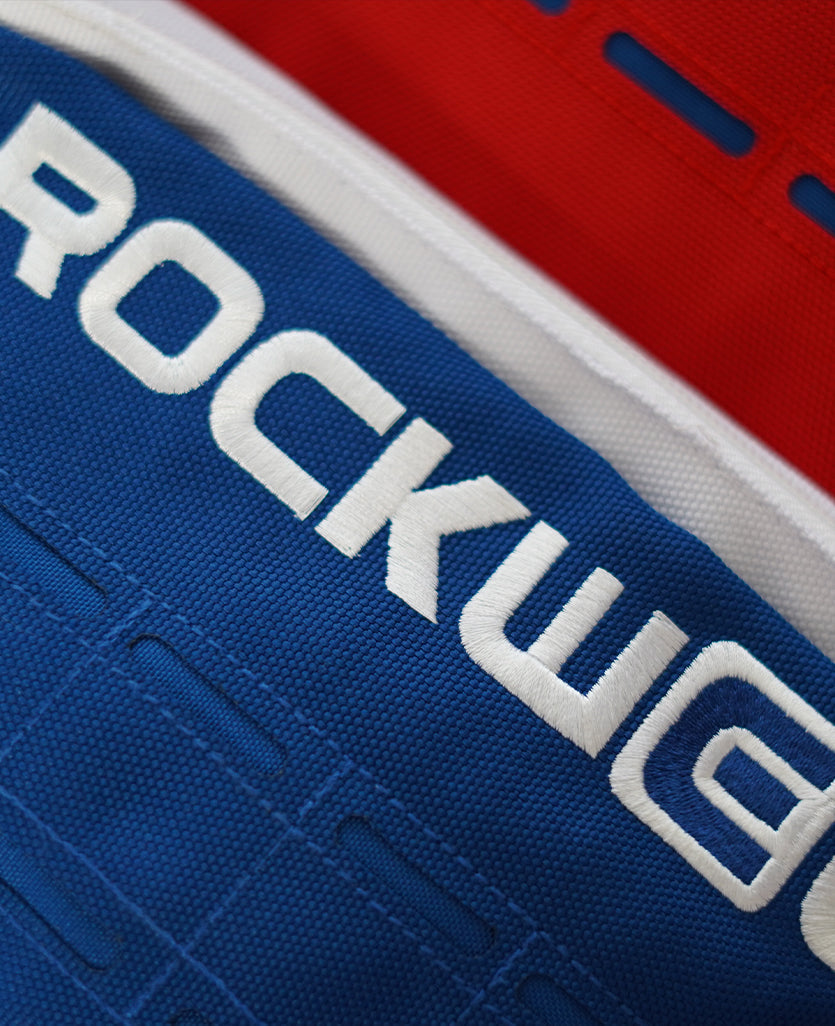 Ruck - Mochila Deluxe de 26 Litros en Rojo, Blanco y Azul