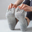 Chaussettes de yoga anti-dérapantes à cinq doigts pour femmes