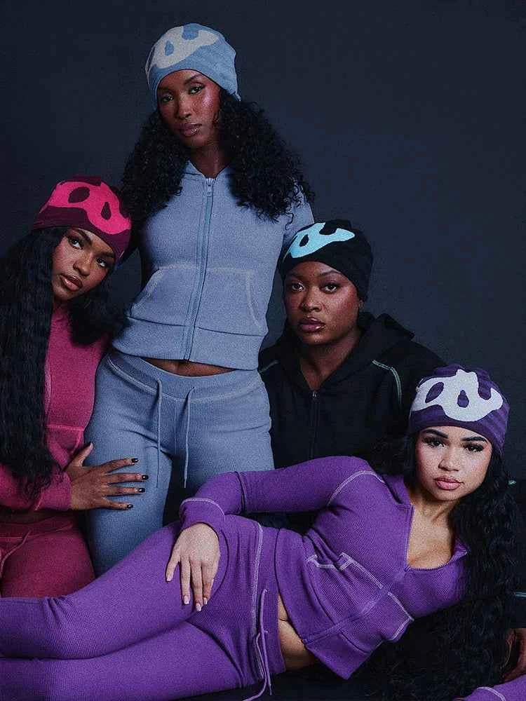 Conjunto de chándal con capucha y cremallera para mujer con pantalones acampanados