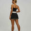 Conjunto Deportivo para Mujeres: Top Corto Acolchado y Falda Corto con Bolsillos
