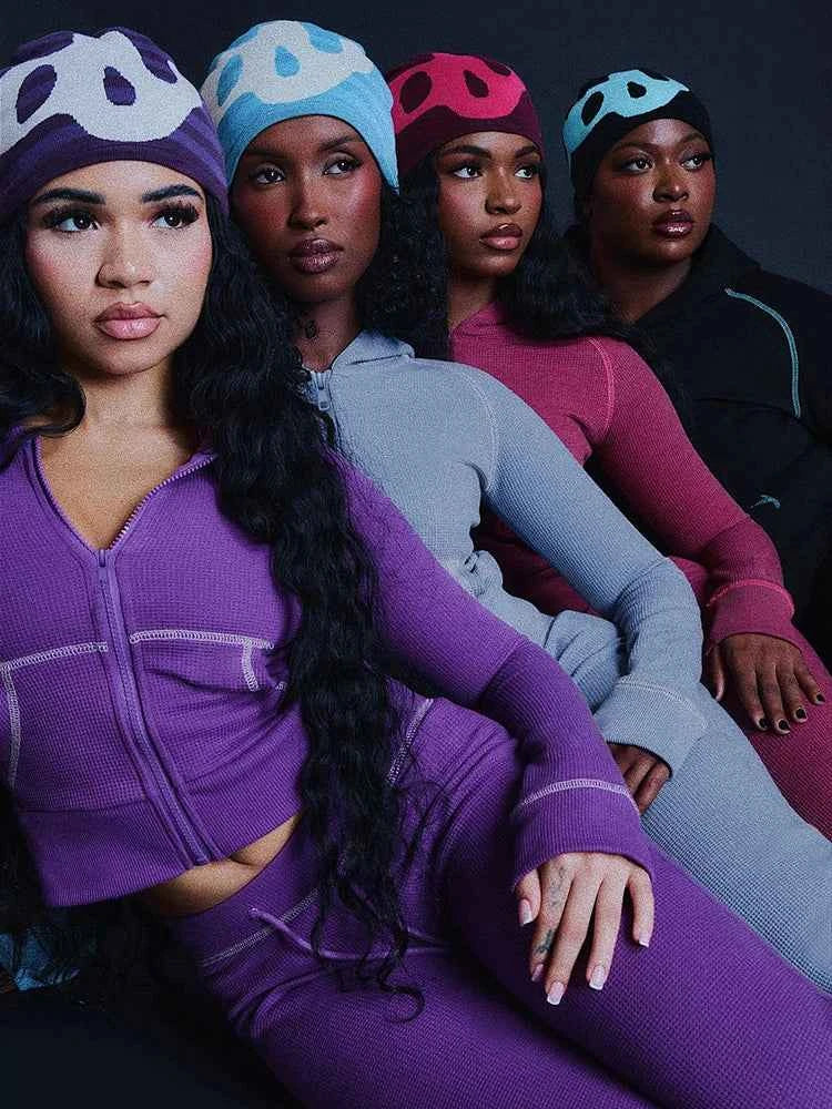 Conjunto de chándal con capucha y cremallera para mujer con pantalones acampanados