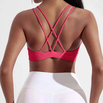 Soutien-gorge de fitness croisé en couleur unie avec coussinets