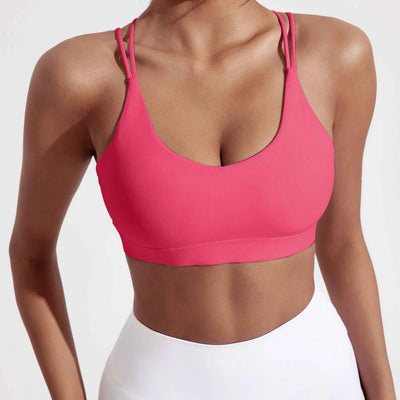 Soutien-gorge de fitness croisé en couleur unie avec coussinets
